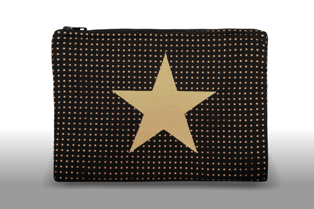 Celena Veil Star Clutch - A striking two-layer clutch featuring a bold embroidery and a pop of color beneath its black perforated surface