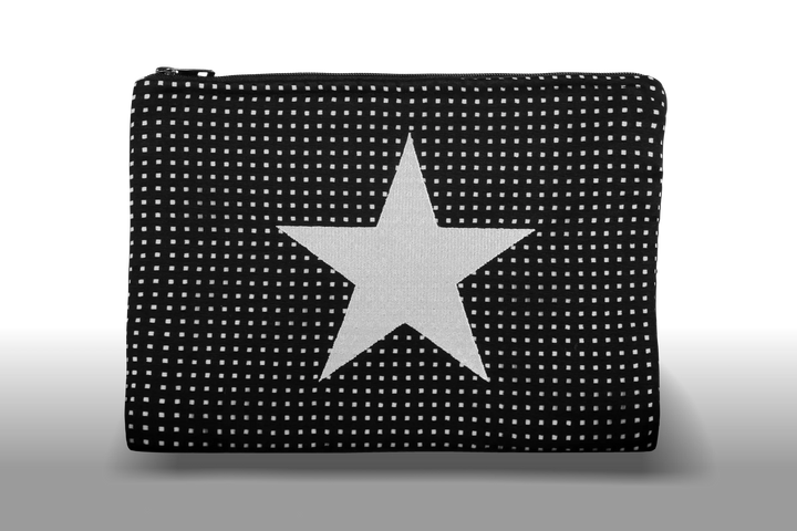 Celena Veil Star Clutch - A striking two-layer clutch featuring a bold embroidery and a pop of color beneath its black perforated surface