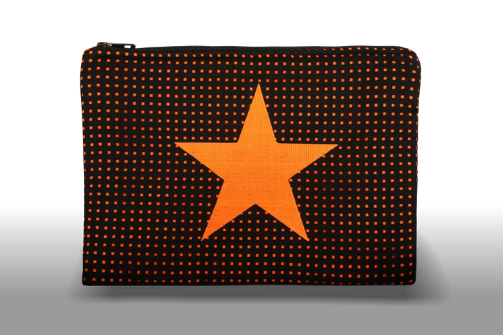 Celena Veil Star Clutch - A striking two-layer clutch featuring a bold embroidery and a pop of color beneath its black perforated surface