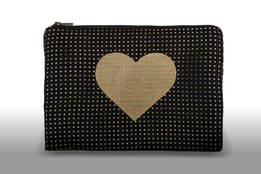 Celena Veil Heart Clutch - A striking two-layer clutch featuring a bold embroidery and a pop of color beneath its black perforated surface