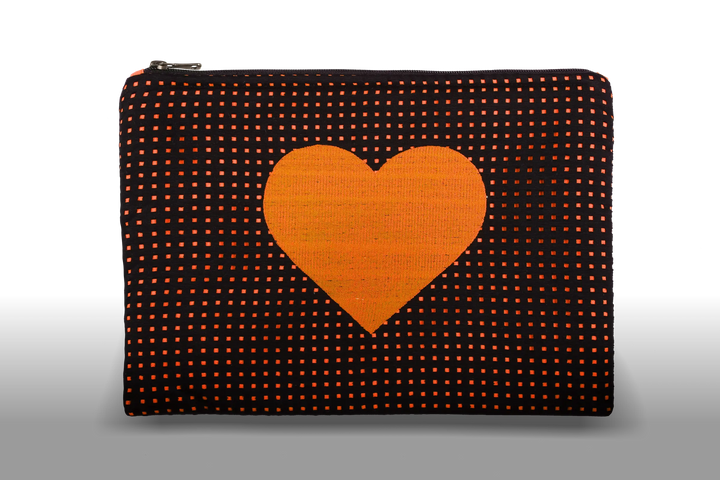 Celena Veil Heart Clutch - A striking two-layer clutch featuring a bold embroidery and a pop of color beneath its black perforated surface