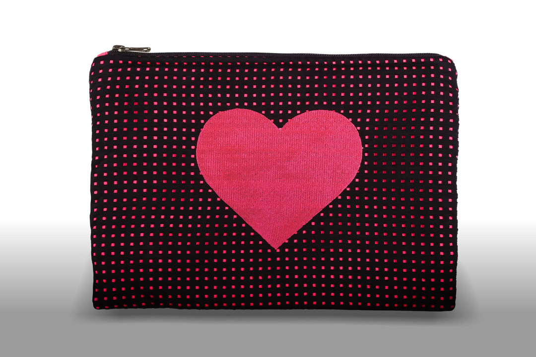 Celena Veil Heart Clutch - A striking two-layer clutch featuring a bold embroidery and a pop of color beneath its black perforated surface