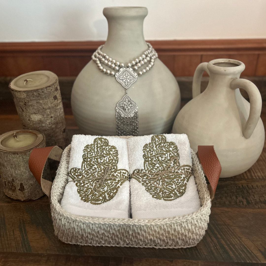Discounted Palazzo 6-Hand Towel Sets made from 100% Egyptian Cotton in a Handmade Crochet Basket - Bronze Hamsa Hand Design