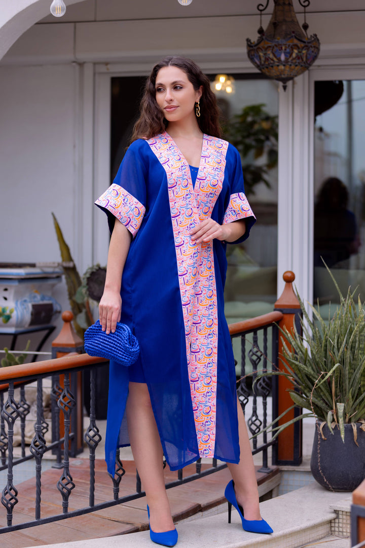 Sara's Harmony: Najaf Kaftan In Turquoise Colour with Arabic Calligraphy bordering the neckline and sleeves