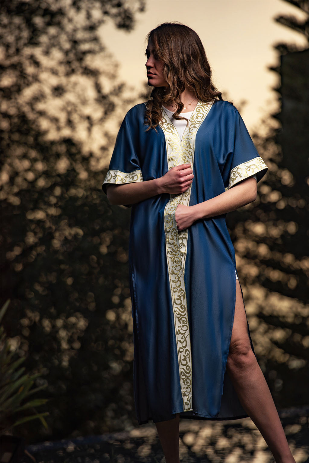 Sapphire Dream Kaftan / Adorned with white and golden Arabic calligraphy